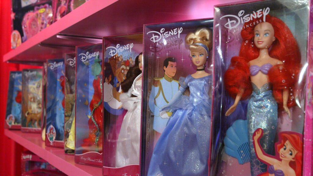An assortment of Disney cartoon character dolls are displayed during the Walt Disney Company  press conference introducing the Disney Princess franchise