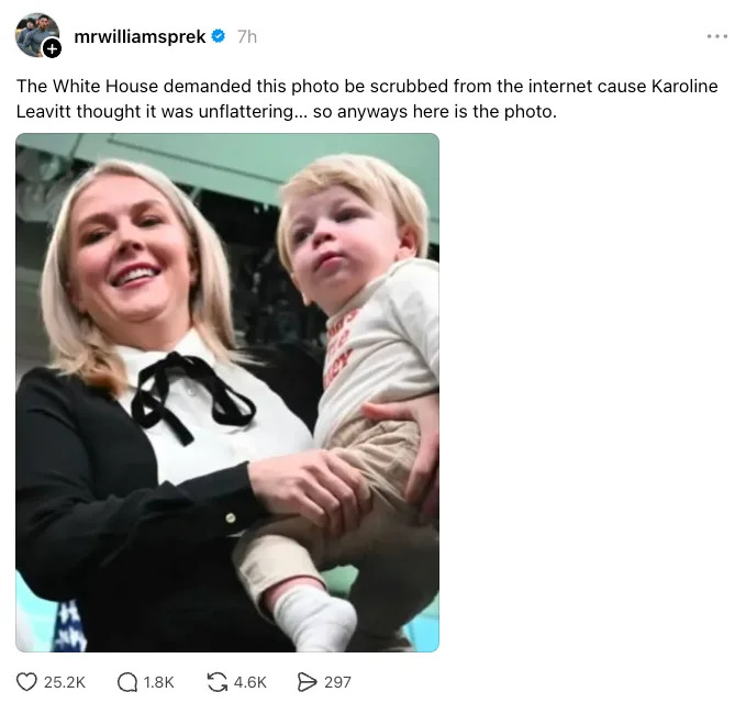 A smiling woman holds a young child in her arms. The accompanying text mentions a demand to remove the photo due to its perceived unflattering nature