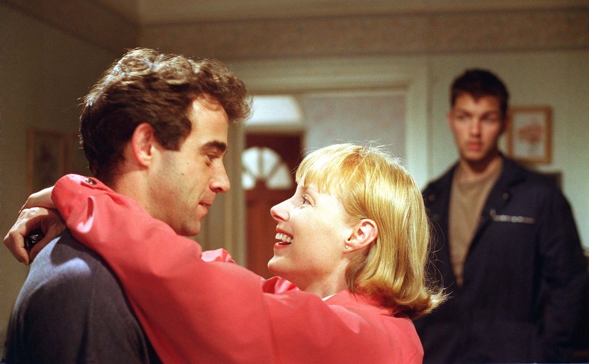 Marsden watching love interest Sally with her husband, and his boss, Kevin Webster in a Coronation Street scene