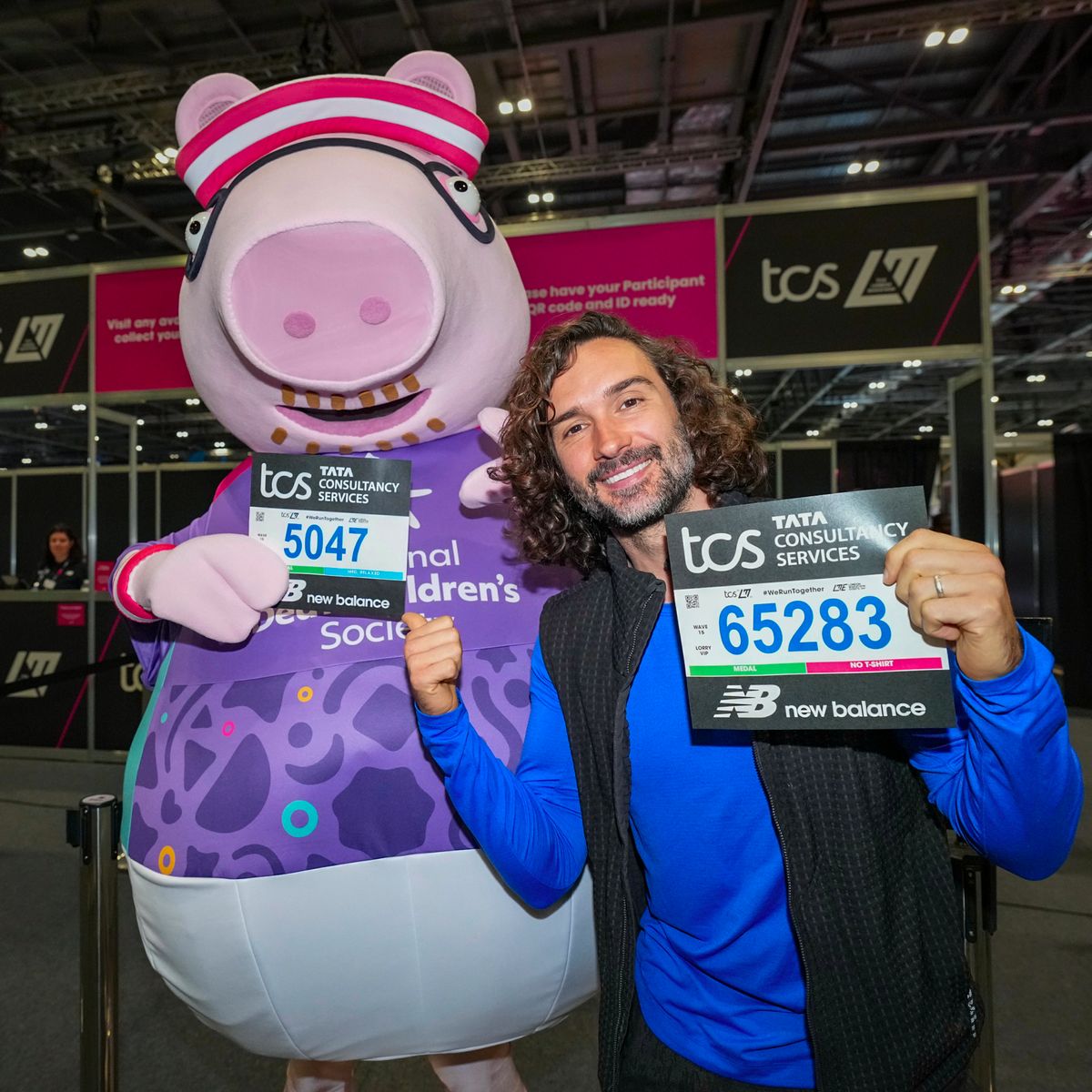 Joe Wicks and Daddy Pig collect their running bibs at the TCS London Marathon Running Show at Excel London, ahead of the 2026 TCS London Marathon.
