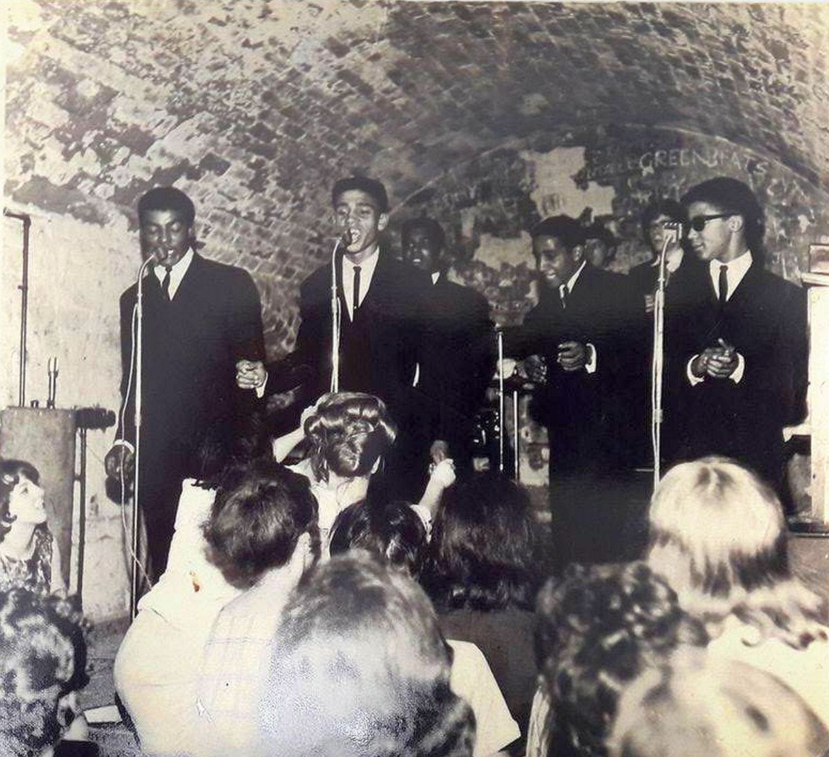 The Chants at the Cavern with Cilla Black watching from the side of the stage