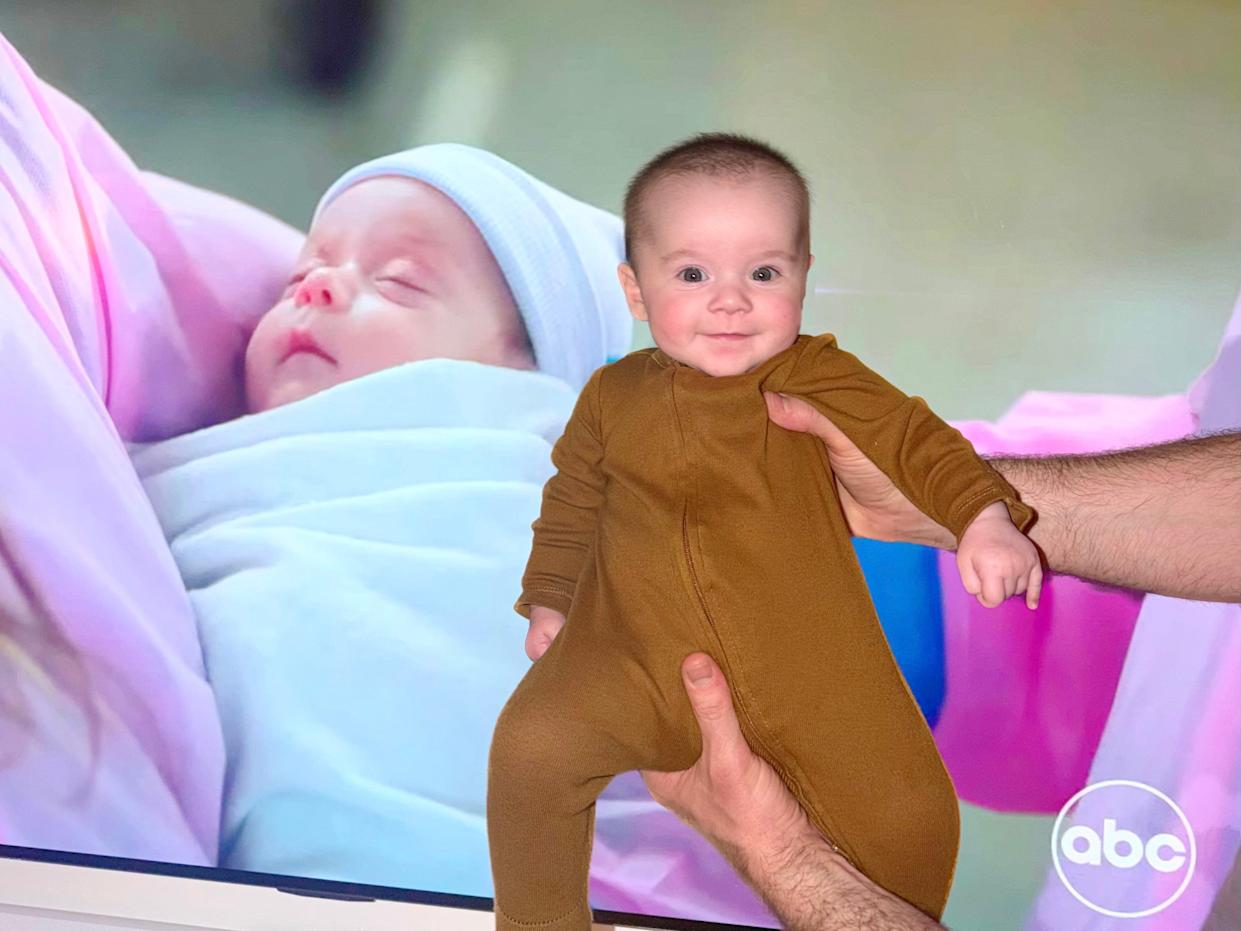 Baby next to TV