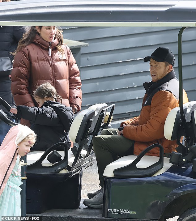 The couple, who held a wedding ceremony in 2022, looked stony-faced during the family day as rumours swirl about their relationship