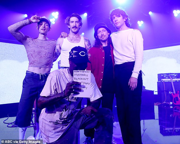 Turnstile members seen left to right during an appearance on Jimmy Kimmel Live in March 2022: Daniel Fang, Franz Lyons, Pat McCrory, Ebert, and Yates