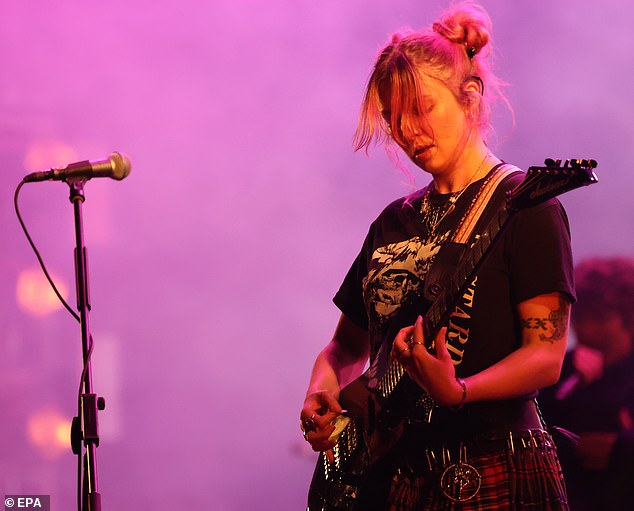 Ebert was later permanently replaced by British musician Meg Mills (seen performing in Paraguay last month)