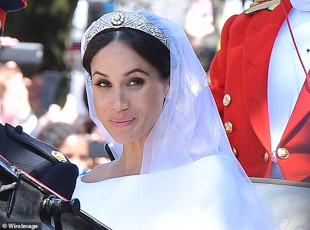 Meghan wore Queen Mary¿s diamond bandeau, but the loan of the tiara by the Queen led to a row when when the Sussexes rang the Palace to ask the Queen¿s dresser and curator, Angela Kelly, to send over the tiara because Meghan wished to practise putting it on