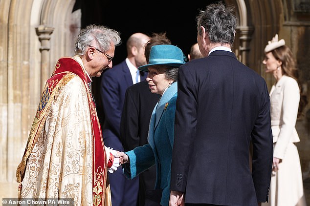 The Princess Royal shaking hands with The Dean of Windsor, the Rt. Rev. Christopher Cocksworth
