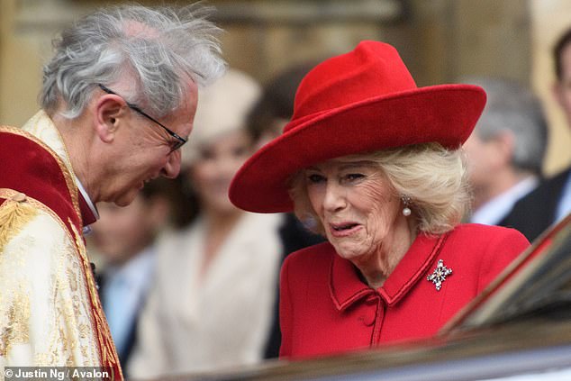 Queen Camilla speaks with the Dean of Windsor, the Rt. Rev. Christopher Cocksworth