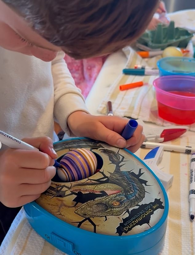 The Duchess shared a rare close up video of Prince Archie as he painted his Easter egg