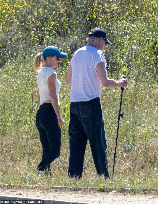 But 73-year-old Baywatch icon — who was outfitted with two trekking poles to handle the uneven terrain out in Calabasas, California — is actually on the upswing after undergoing both knee- and hip-replacement surgery, the Daily Mail has learned