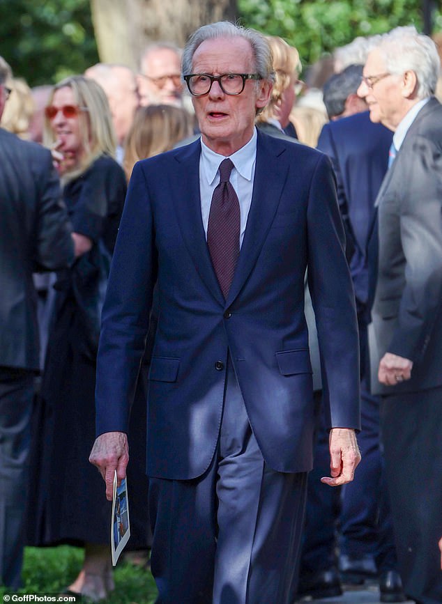 Bill Nighy, who Robert had a long standing professional relationship with, was seen arriving in a navy blue suit