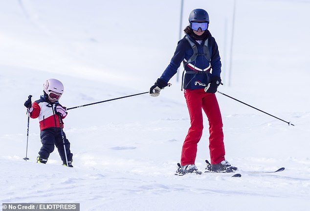 She smiled as she gently encouraged Grace, while she turned and urged on Rose who was intently holding on to her other pole