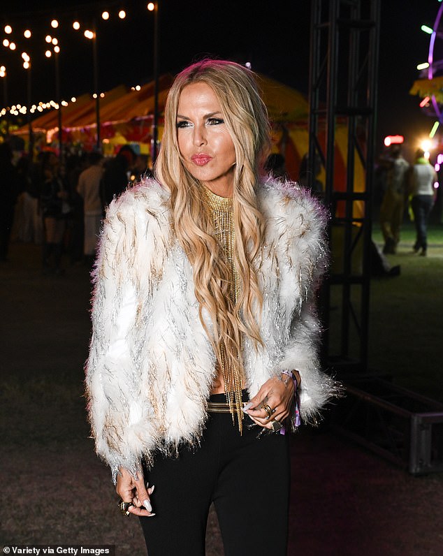 The fashion designer and reality TV personality paired her fuzzy, sparkly outerwear with black, bellbottom pants and stacks of gold jewelry