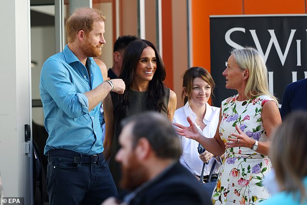 Prince Harry and Meghan, the Duke and Duchess of Sussex, depart Swinburne University after a visit to the 'batyr'