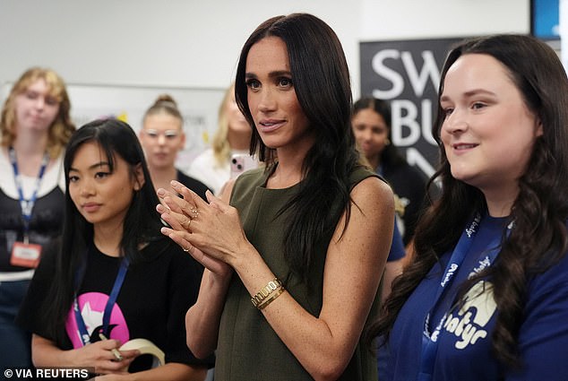 Meghan Markle meets students at Batyr, a mental health engagement programme, at Swinburne University of Technology, where she said she was the most 'trolled person in the entire world'