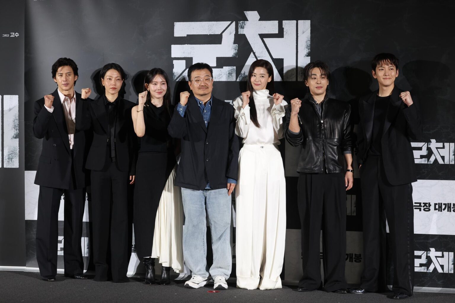 From left, actors Go Soo, Kim Shin-rok, Shin Hyun-been, director Yeon Sang-ho, actors Jun Ji-hyun, Koo Kyo-hwan and Ji Chang-wook pose during a press conference for the upcoming movie