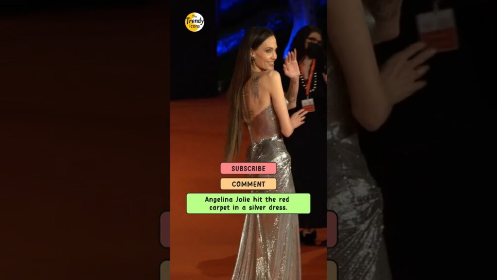 Angelina Jolie hit the red carpet in a silver dress. #angelinajolie