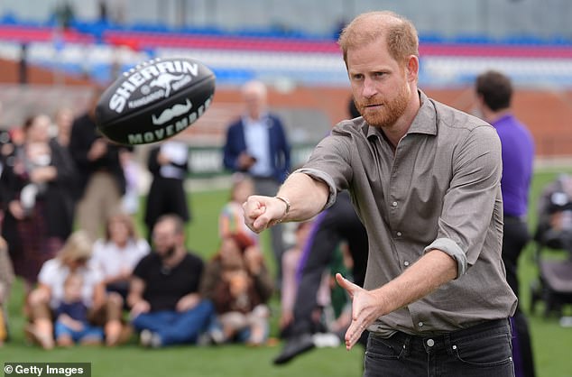 MELBOURNE, AUSTRALIA - APRIL 15: Prince Harry, Duke of Sussex punches a sherrin ball during a Western Bulldogs Australian rules football session at a visit to Movember at the Western Bulldogs HQ at Mission Whitten Oval on April 15, 2026 in Footscray, Melbourne, Australia. Meghan and Prince Harry, Duke of Sussex are on a four-day visit to Australia, with engagements across Melbourne, Canberra and Sydney. (Photo by Jonathan Brady-Pool/Getty Images)