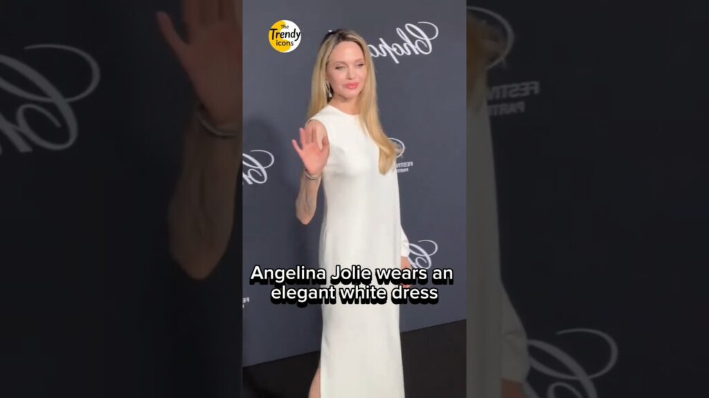 Angelina Jolie wears an elegant white dress #angelinajolie