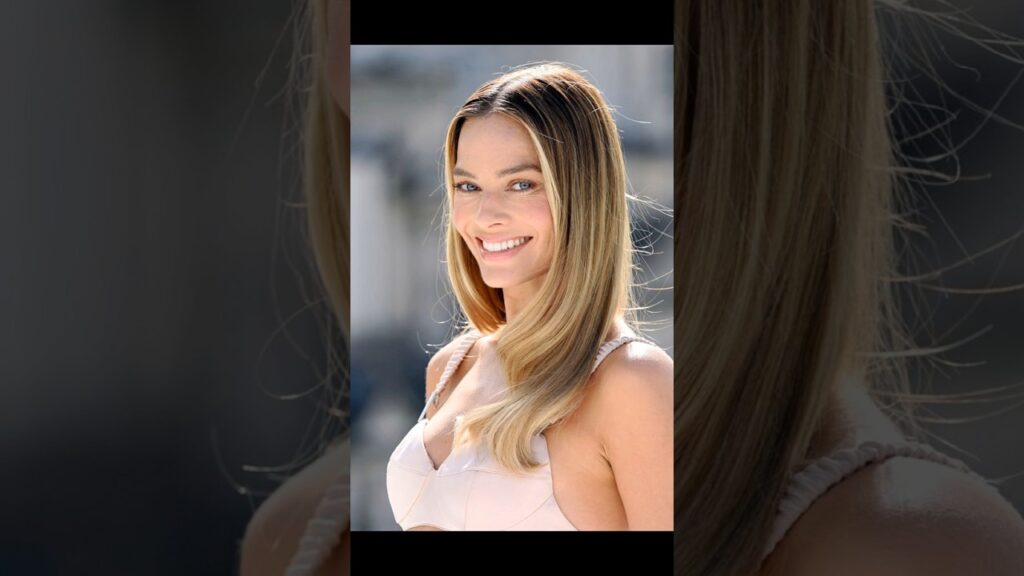 Margot Robbie with warm blonde hair color 😩