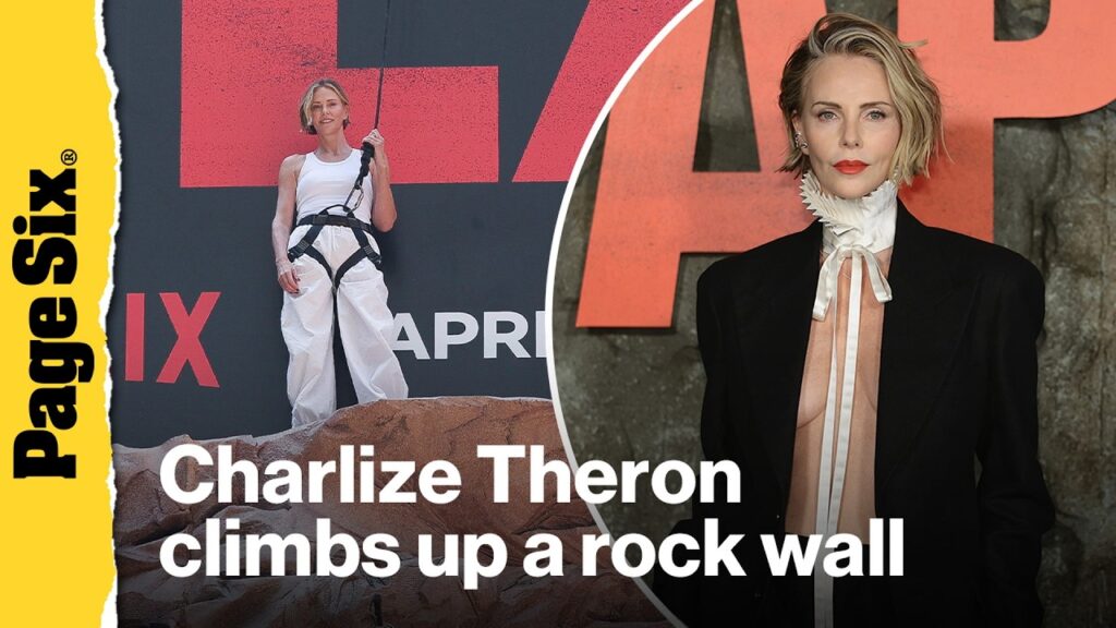Charlize Theron climbs up a rock wall for the film promo 'Apex' in Times Square