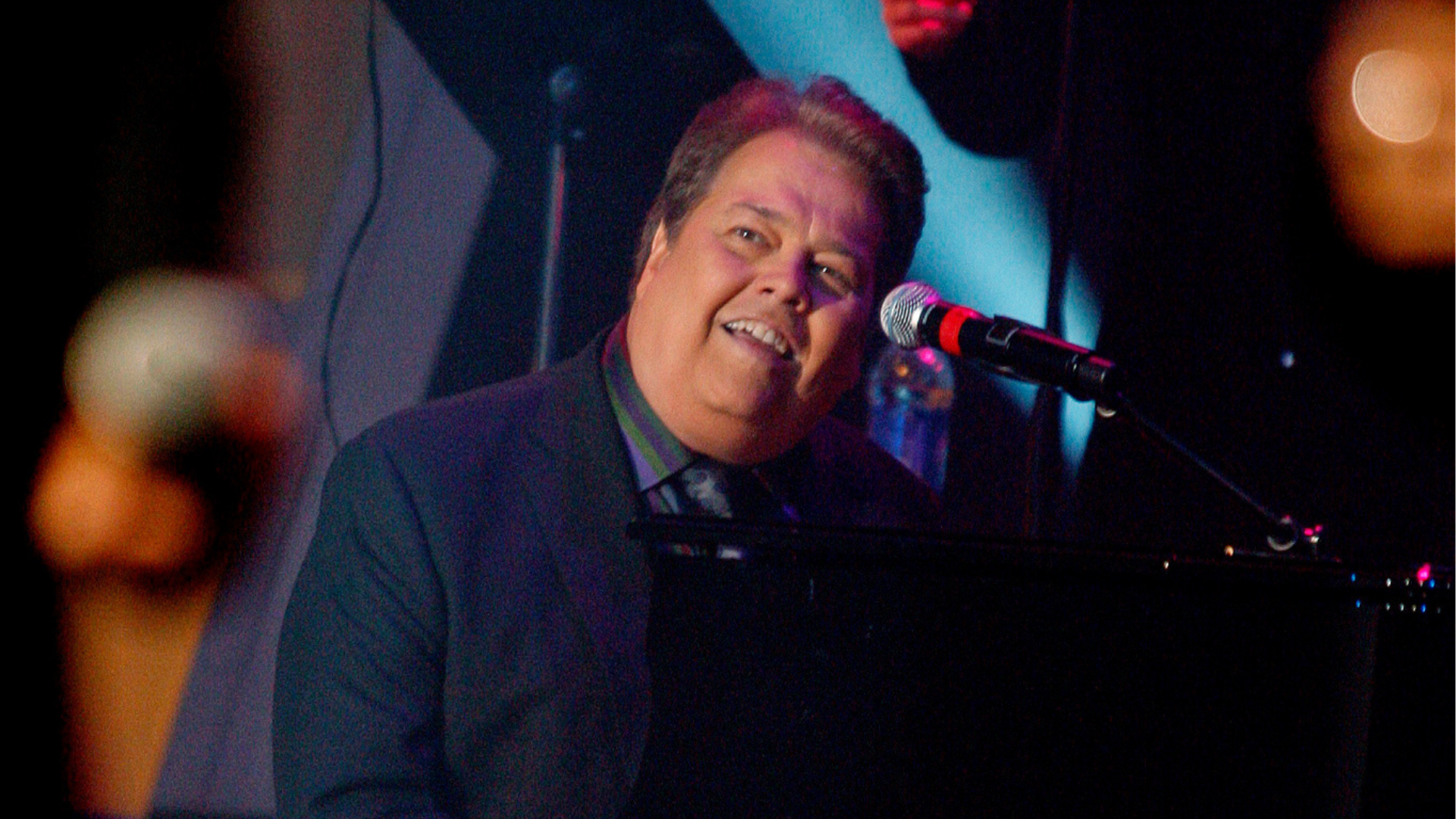 FILE - Alan Osmond performs during a taping of the Osmonds 50th anniversary show in Las Vegas on Aug. 14, 2007.