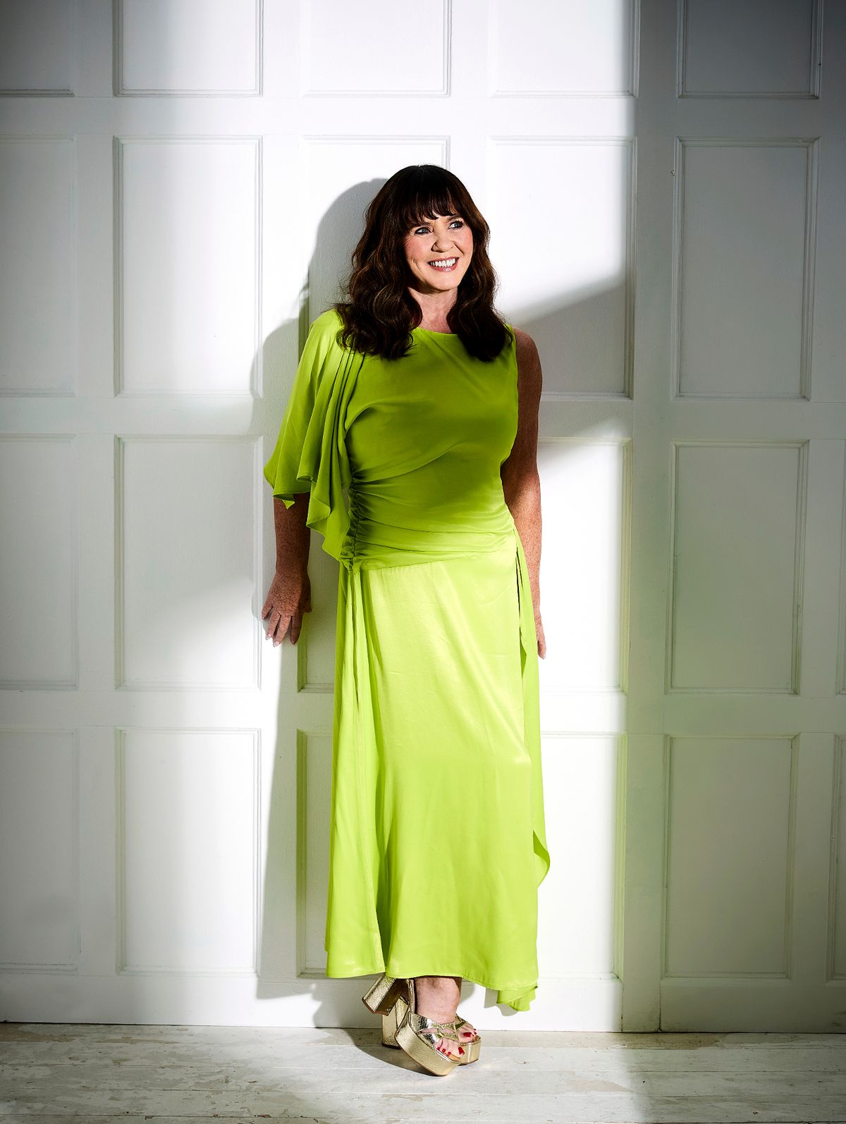 coleen nolan in bright green dress