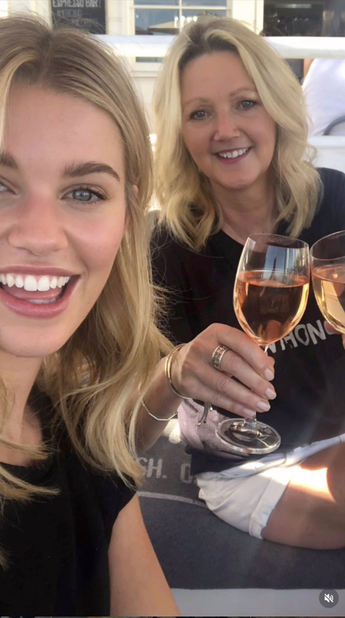 hannah dommett and her mum with wine in selfie