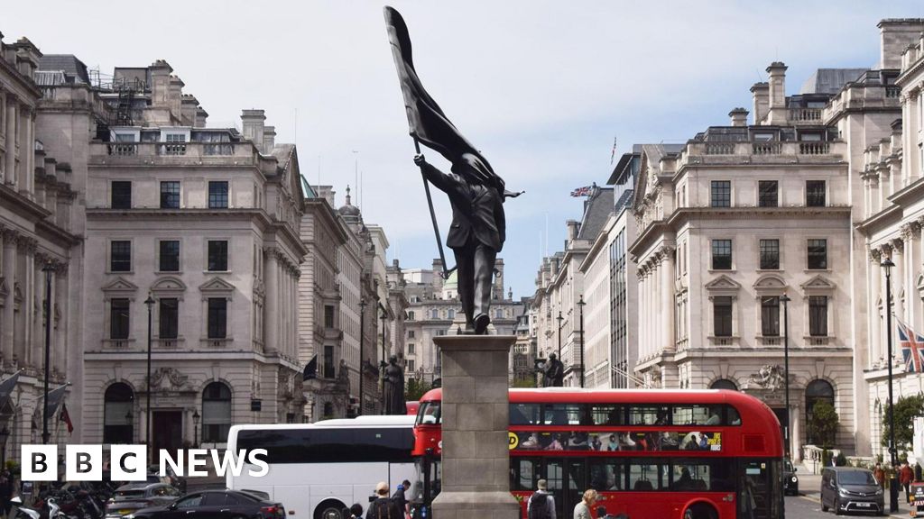 Banksy confirms he's behind statue in central London - BBC