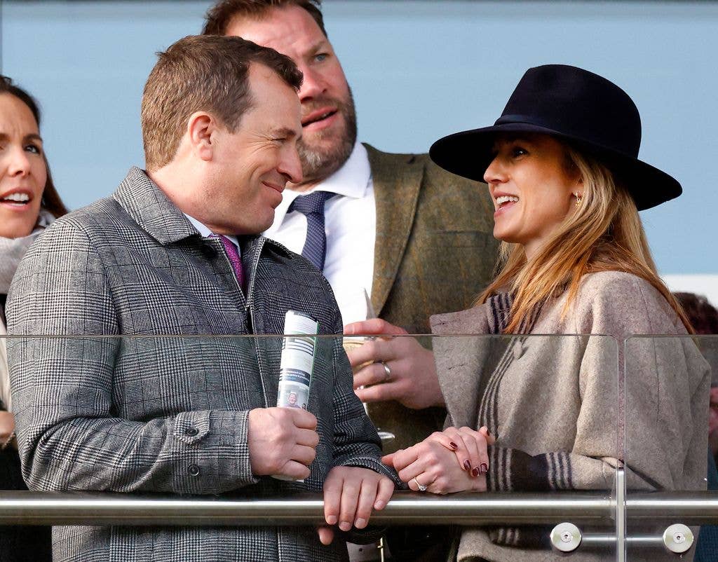 Peter Phillips and Harriet Sperling attend the New Year's Day Racing Meet at Cheltenham Racecourse