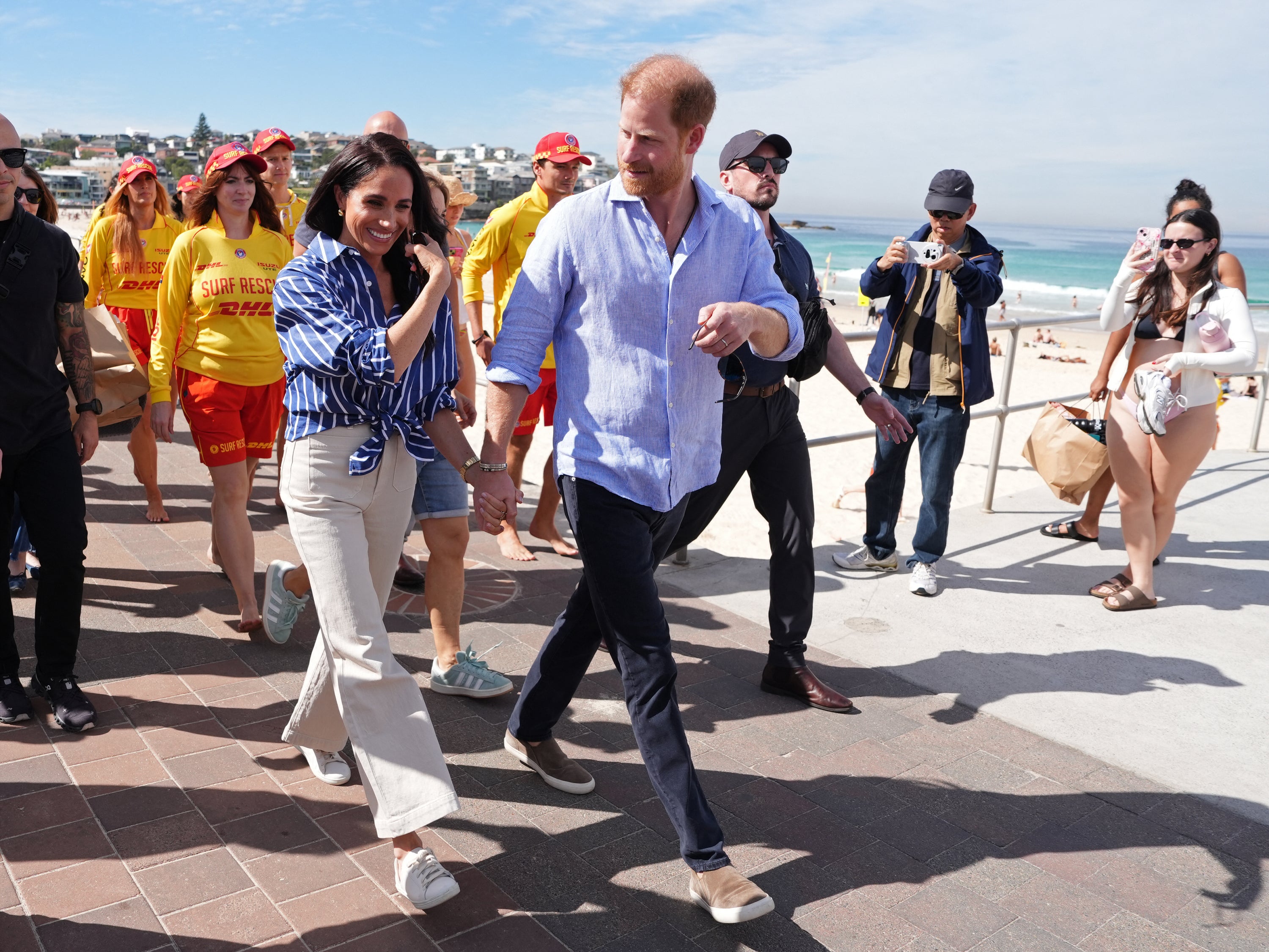 The pair visiting Bondi beach – an ‘unbothered’ sunbathing queen, not pictured