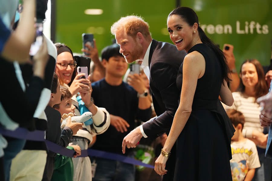 Meghan and Prince with kids and families at the Royal Children's Hospital