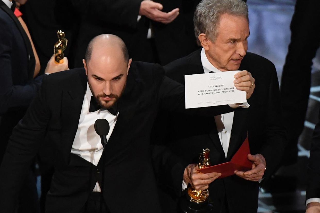Jordan Horowitz shows the card reading Best Film 'Moonlight