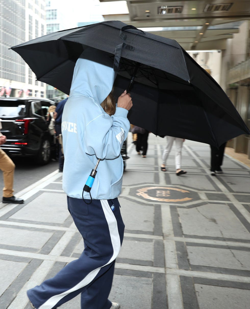 Sydney Sweeney photographed arriving on the set of 'The Devil Wears Prada 2' in August 2025.