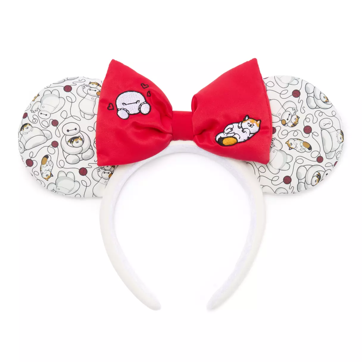 This Baymax and Mochi ear headband is made of white fabric with a red fabric bow. The headband part is solid white and lined with white non-slip velour. 