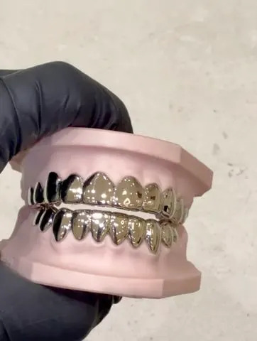 North West's 14kt white gold grill.Credit: Gabby Elan Jewelry/Instagram