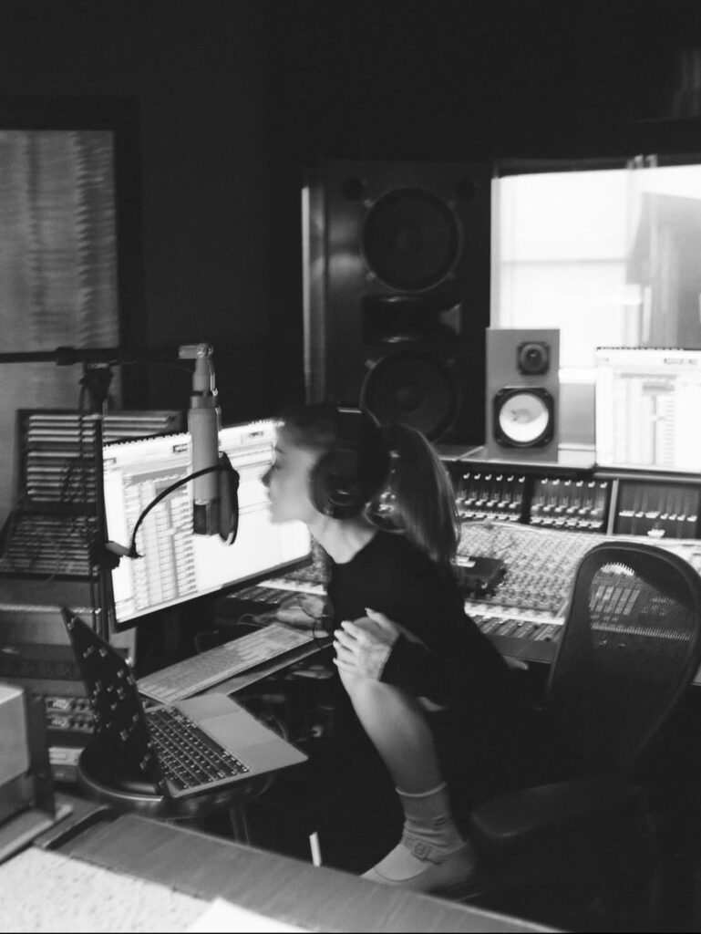 After weeks of teasing, Ariana Grande releases pictures of herself working on her soon to be released 8th studio album.