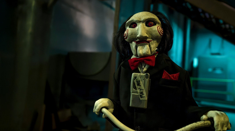 The Billy Puppet on his bike in Saw: The Final Chapter
