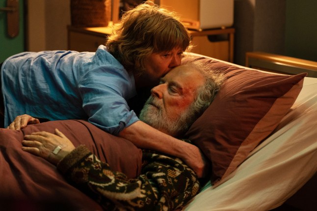 Julie kisses Nigel goodbye in EastEnders