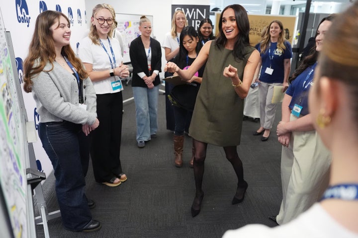 The duchess speaks with advocates during a visit to Batyr.