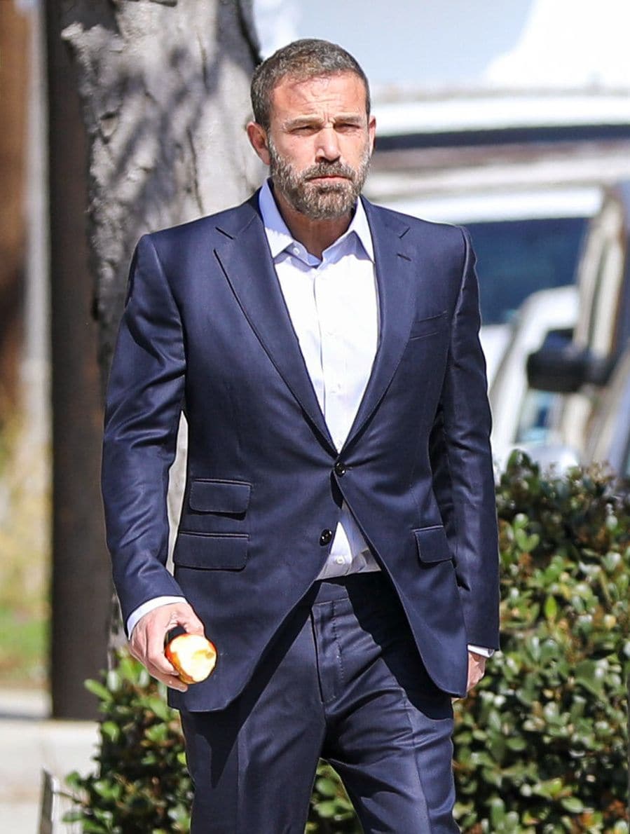 
Ben Affleck is back on his wellness grind and looking sharper than ever doing it. The 00 million man stepped out in a crisp blue suit and dark shades for his return to Santa Monica's Soulaire Anti-Aging clinic, picking up right where he left off after allowing himself a rare Easter weekend break from his now daily spa and apple. 