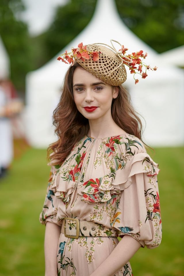 Lily Collins at the Cartier Queen’s Cup Polo at Guards Polo Club on June 17, 2018 in Egham, England.️