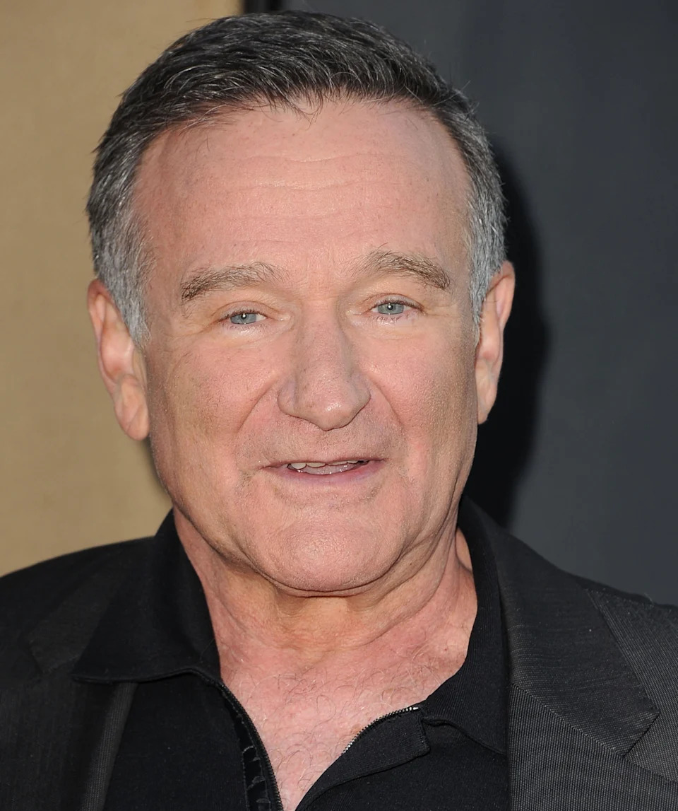 Robin Williams in a collared shirt
