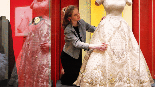 A new exhibition in London tracks the late Queen’s  fashion and style over her life and reign.