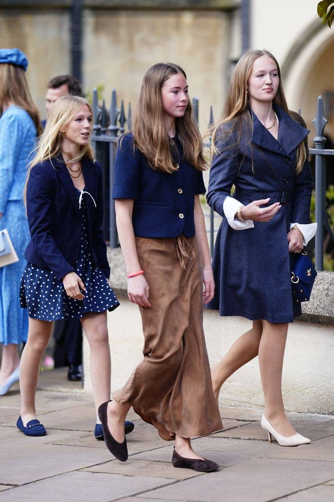 Isla Phillips, Harriet Sperling's daughter Georgina and Savannah Phillips leave after attending the Easter Service at St George's Chapel, Windsor Castle, Berkshire