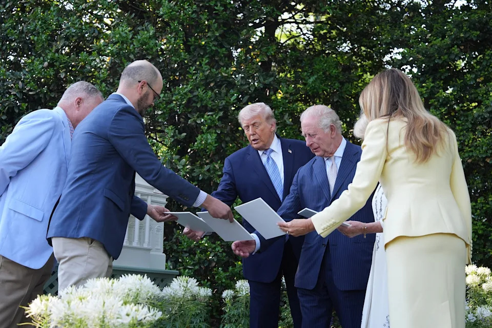 Alex Brandon/AP - PHOTO: President Donald Trump and Britain's King Charles III look at the White House garden and bee hive on the South Lawn of the White House, April 27, 2026, in Washington.