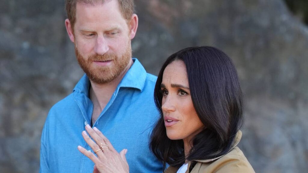 Prince Harry and Meghan Markle share sweet kiss on the lips in unseen moment from their Australia trip