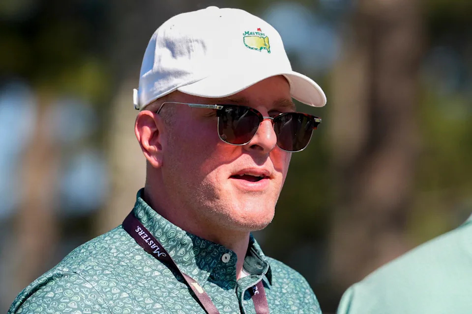 Apr 11, 2026; Augusta, Georgia, USA; Pat McAfee waits to walk across the 15th crossway during the third round of the Masters Tournament at Augusta National Golf Club. Mandatory Credit: Katie Goodale-Imagn Images