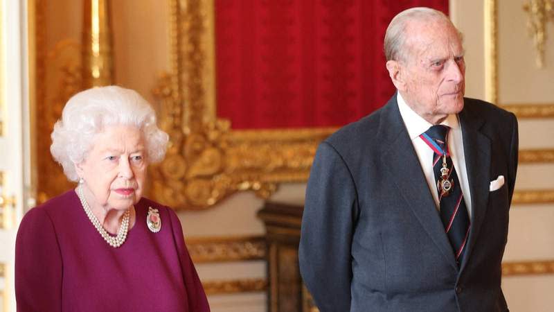 Queen Elizabeth II and Prince Philip join members of the Order of Merit for a group photograph ahead of a luncheon at Windsor Castle in 2019. By: MEGA