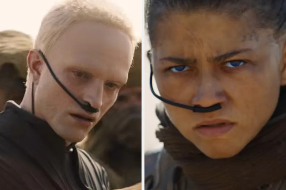 Two characters from a sci-fi film wearing nose devices and intense expressions, suggesting tension or confrontation